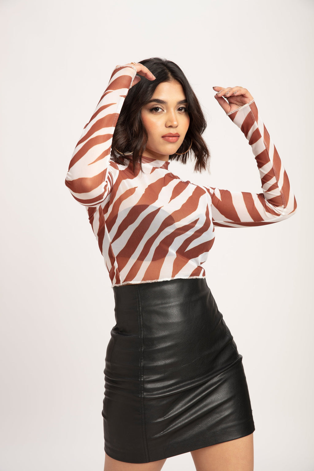RǏWYÑ | Animal Print Mock Top