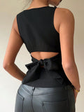 RǏWYÑ | Peek and Tie Backless Top