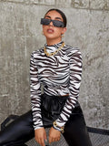 RǏWYÑ | Animal Print Mock Top