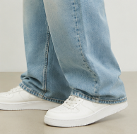 RÎWYÑ Light Wash Wide-Leg Jeans hem detail