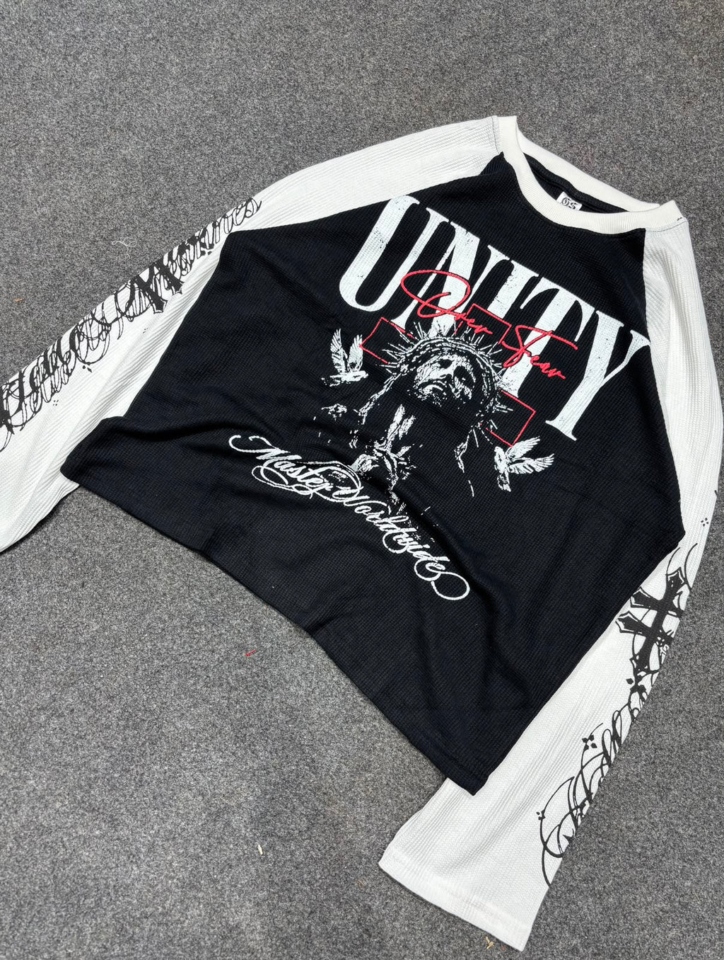 Black and white full-sleeve graphic tee front view
