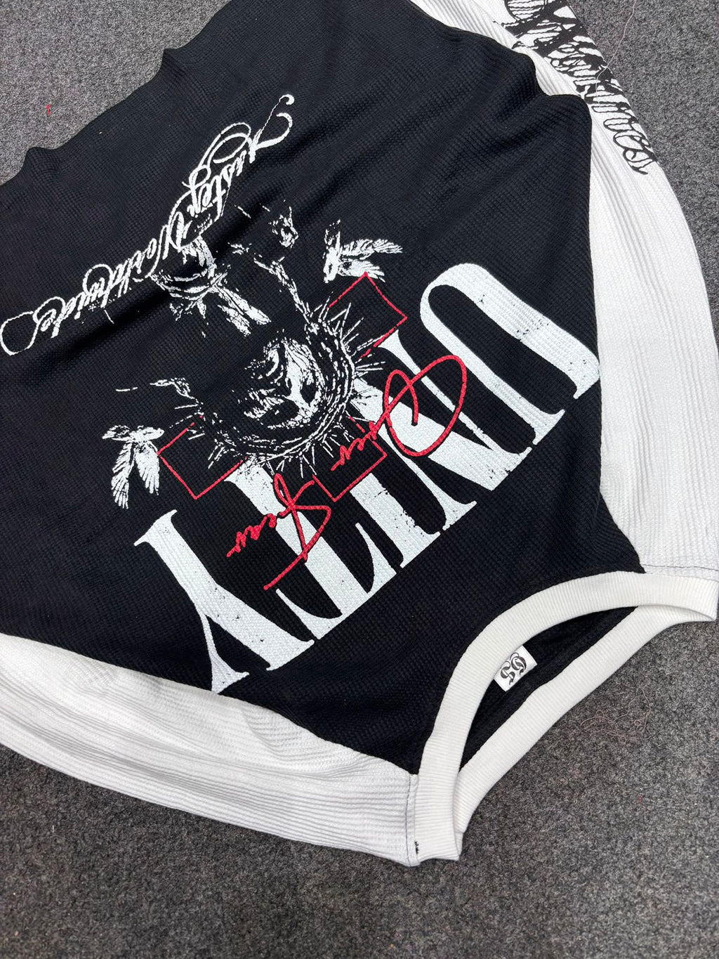 Black and white graphic tee detail view