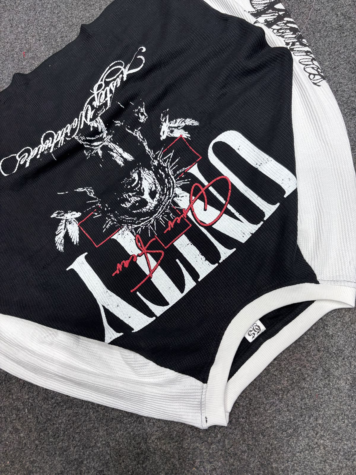 Black and white graphic tee detail view